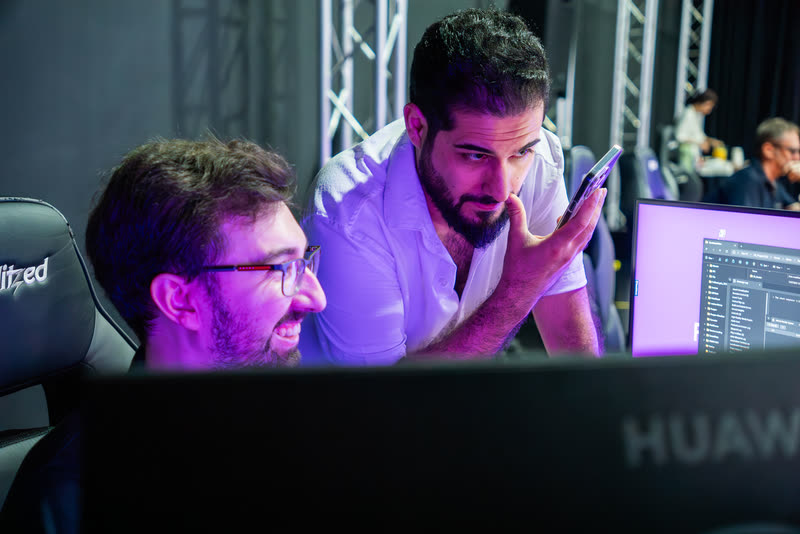 Hamed Tayebi reviewing the Unreal Engine environment with an operator during a shoot