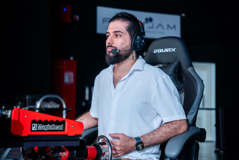 Hamed Tayebi operating a camera remote head on an LED volume stage