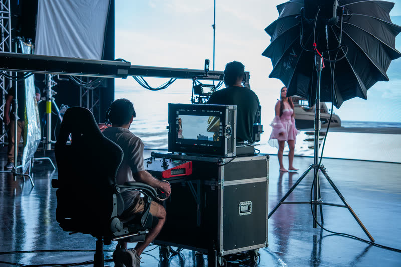 DIT and colour station monitoring the camera image on an LED volume with an ocean environment